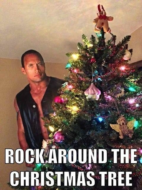 man-rock-áround-christmas-tree.jpeg