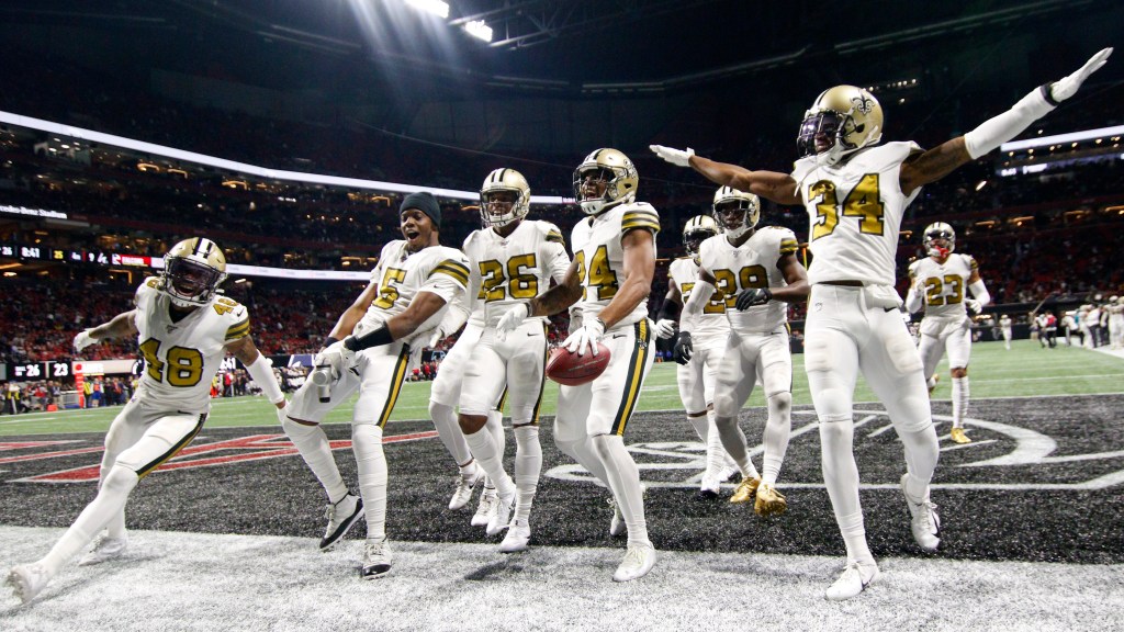 Saints celebrate division win, but acknowledge 'The South Is Not Enough