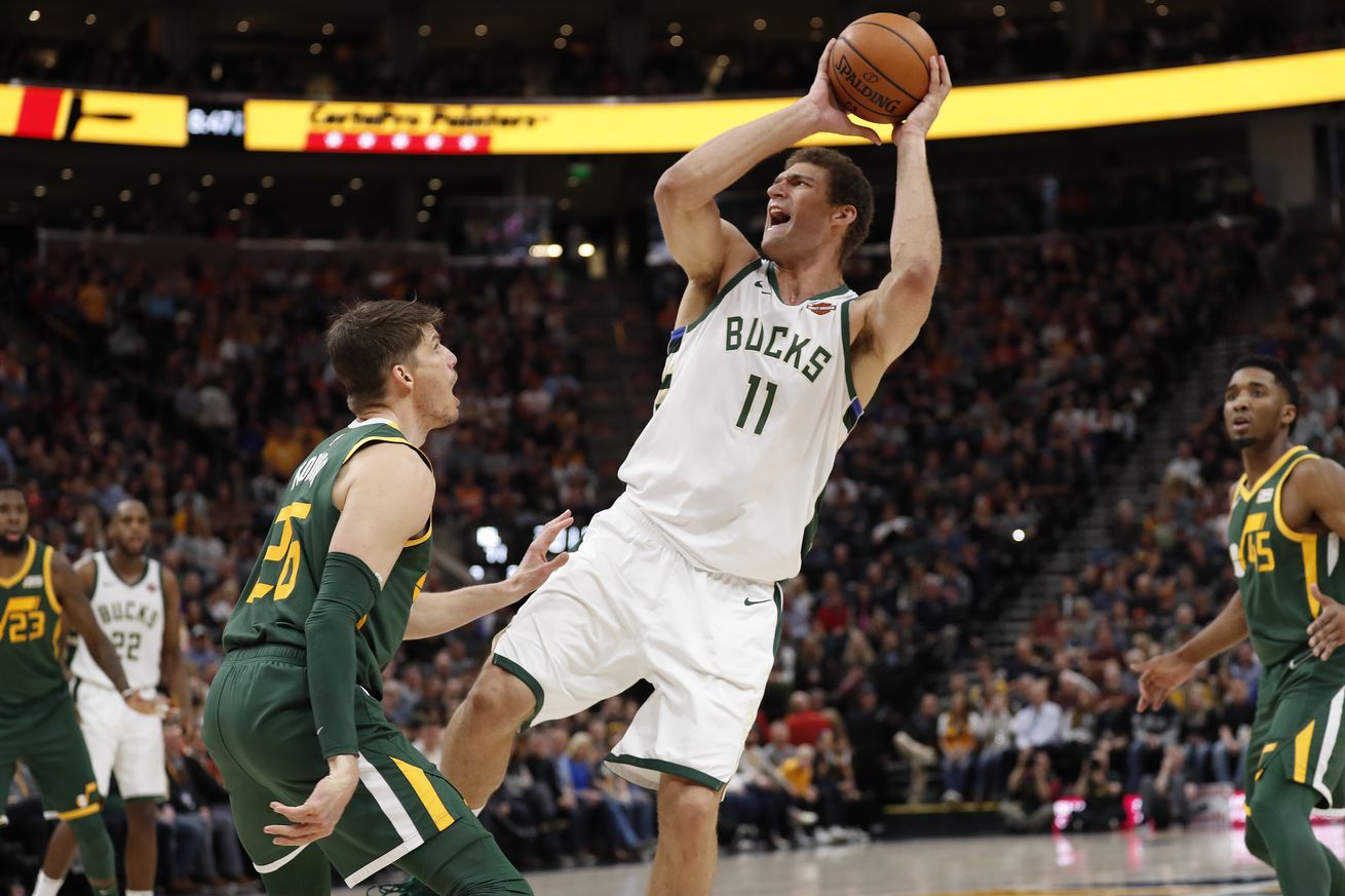 Brook Lopez shooting a shot over Kyle Korver in a March 2, 2019 contest in Utah