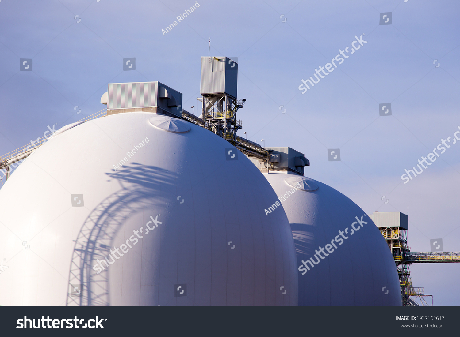 stock-photo-two-meter-white-grain-silos-built-in-in-the-quebec-city-port-along-the-st-lawrence-river-1937162617.jpg